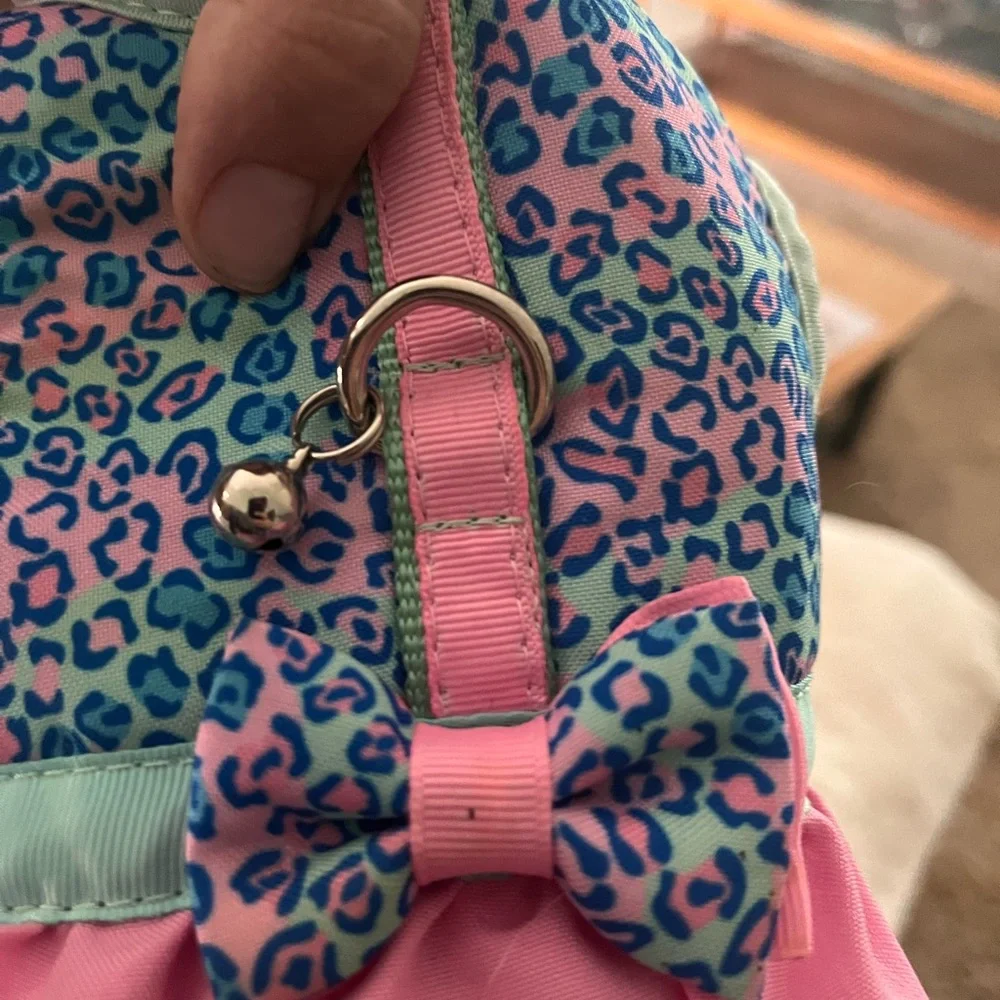 Velcro cat/dog harness with a bell and a tutu.